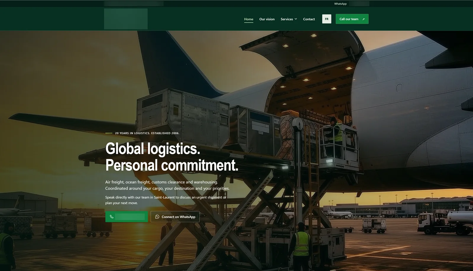 Home page of a freight forwarder website we built, with the company name, logo and phone numbers blurred